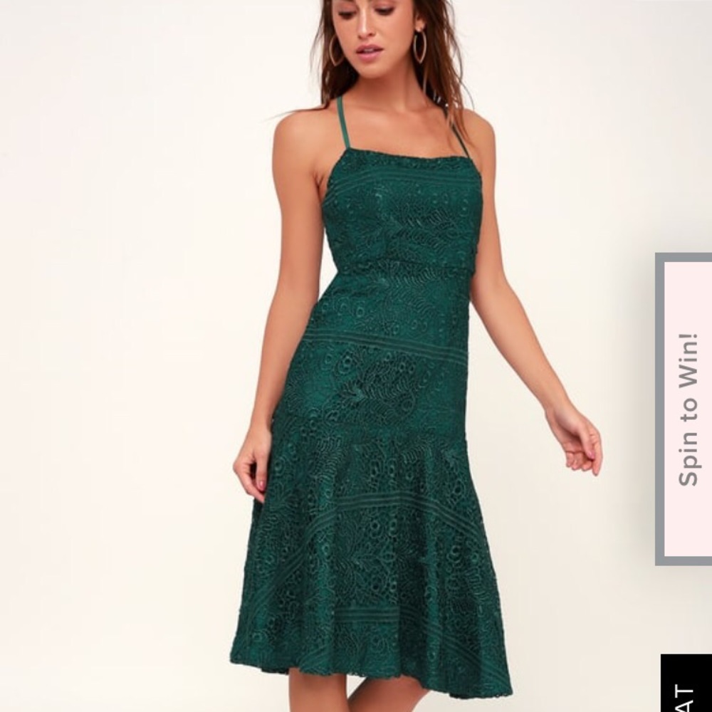 Emerald Green knee length open back dress!